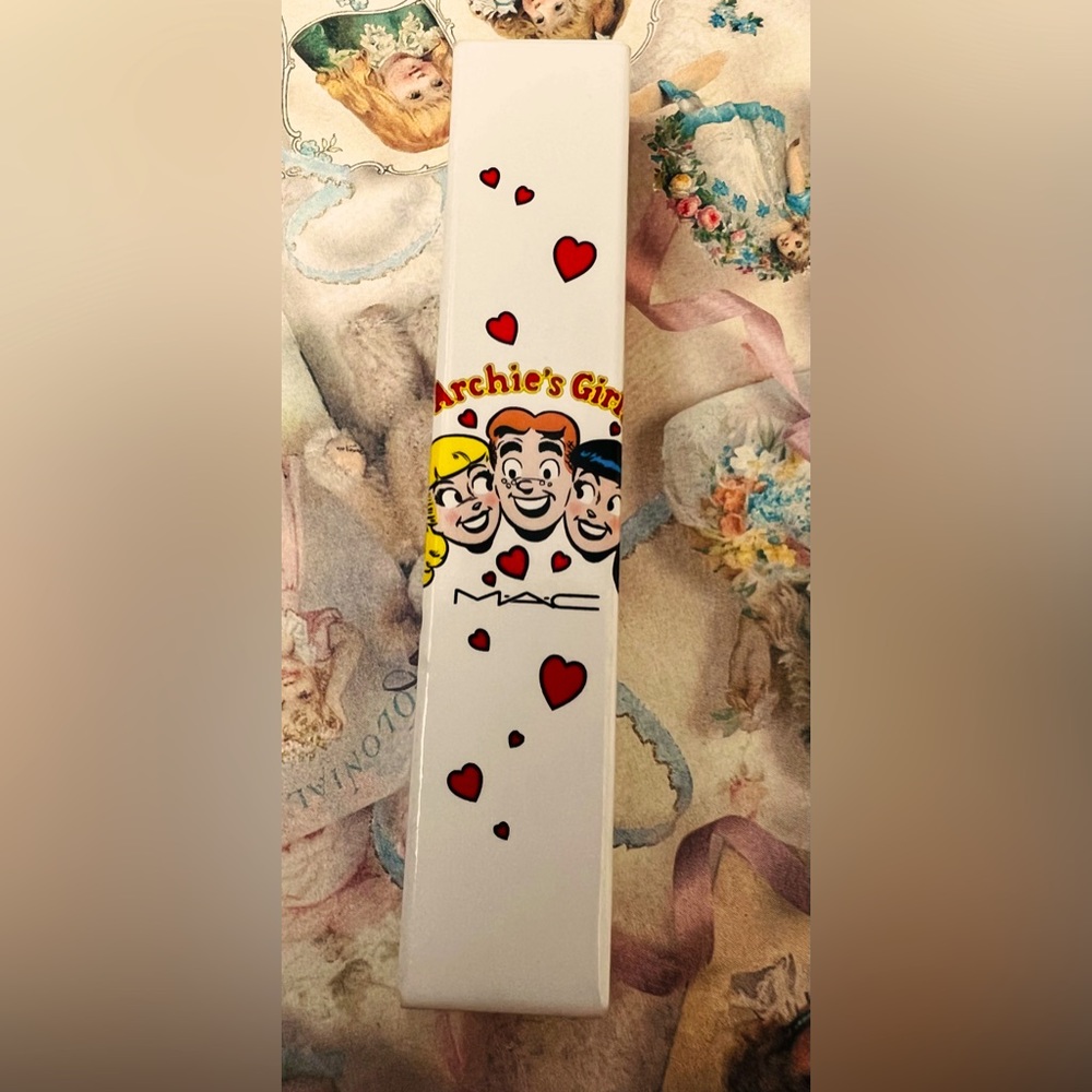 MAC special edition “Archie’s Girls” lipgloss, “Feeling so good”. New in box.